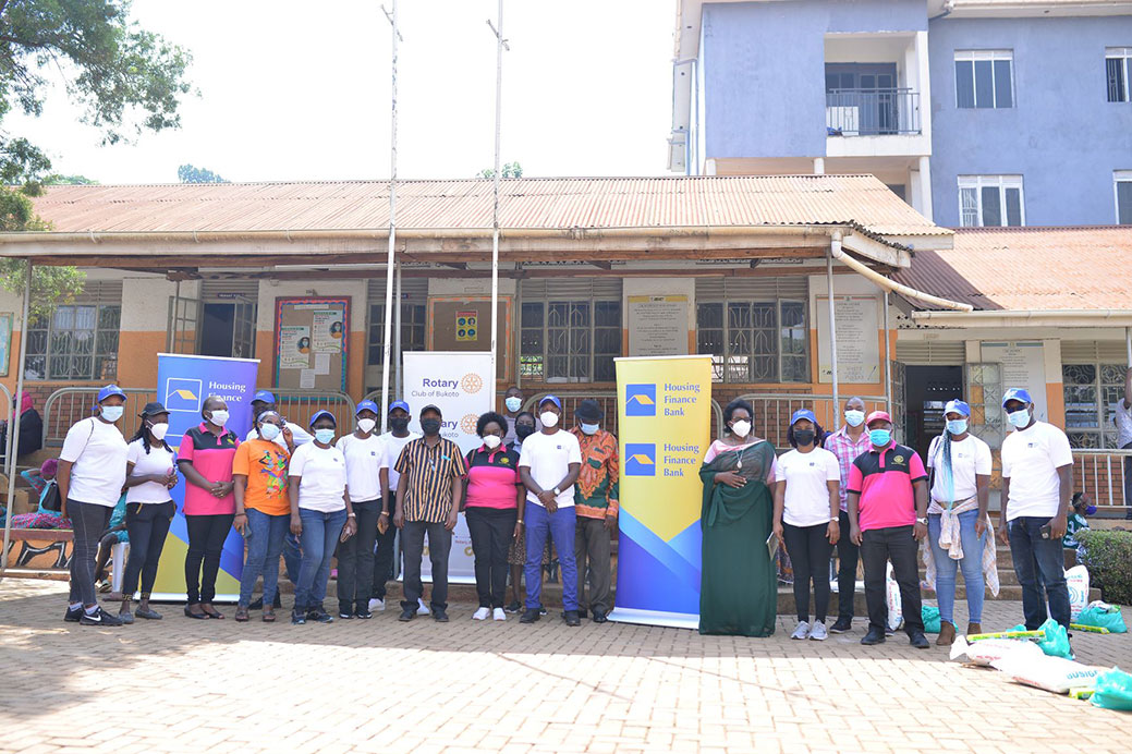 Housing Finance Bank staff with members of the Rotary Club of Bukoto