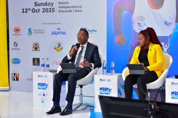 Mr Michael Mugabi(Left) the Managing Director of HFB addressing media, stalkerholdrs and partners after committing UGX 100M at the launch of the NSSF Run happening on 12th October 2025 at Kololo Independence