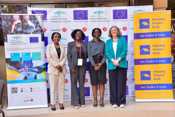 Housing Finance Bank team Marrietta Naiga Chief Risk officer,pose for a group photo with Cristiana Banuta the programme manager