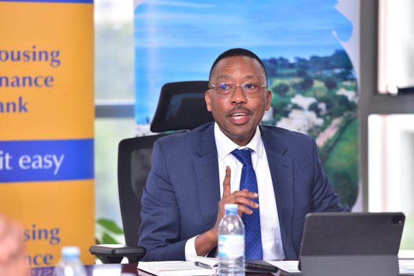Michael Mugabi, Managing Director of Housing Finance Bank, addressing the media at the Head Office during the signing of the MOU with Pearl Marina Estate.