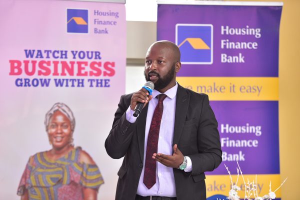 Mr. John Baptiste Kaweesi, Head of Mortages and Consumer Banking addressing the media and attendees at the recently concluded 3rd edition of the HFB Business clinic held at their head office in Kololo