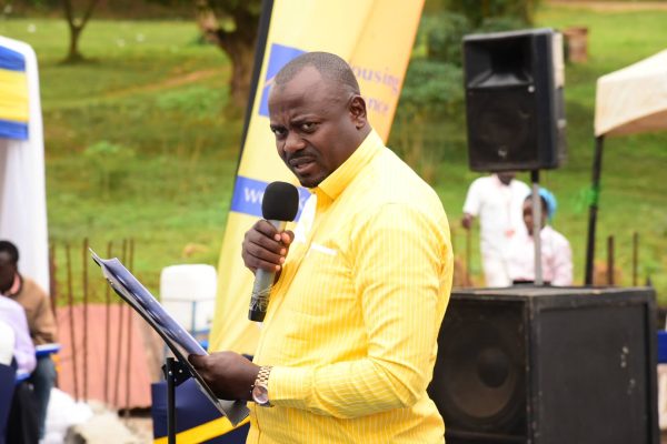 The Guest of Honor, Hon. Haruna Kyeyune Kasolo, the Minister of State for Microfinance and Small Enterprises in the Ministry of Finance